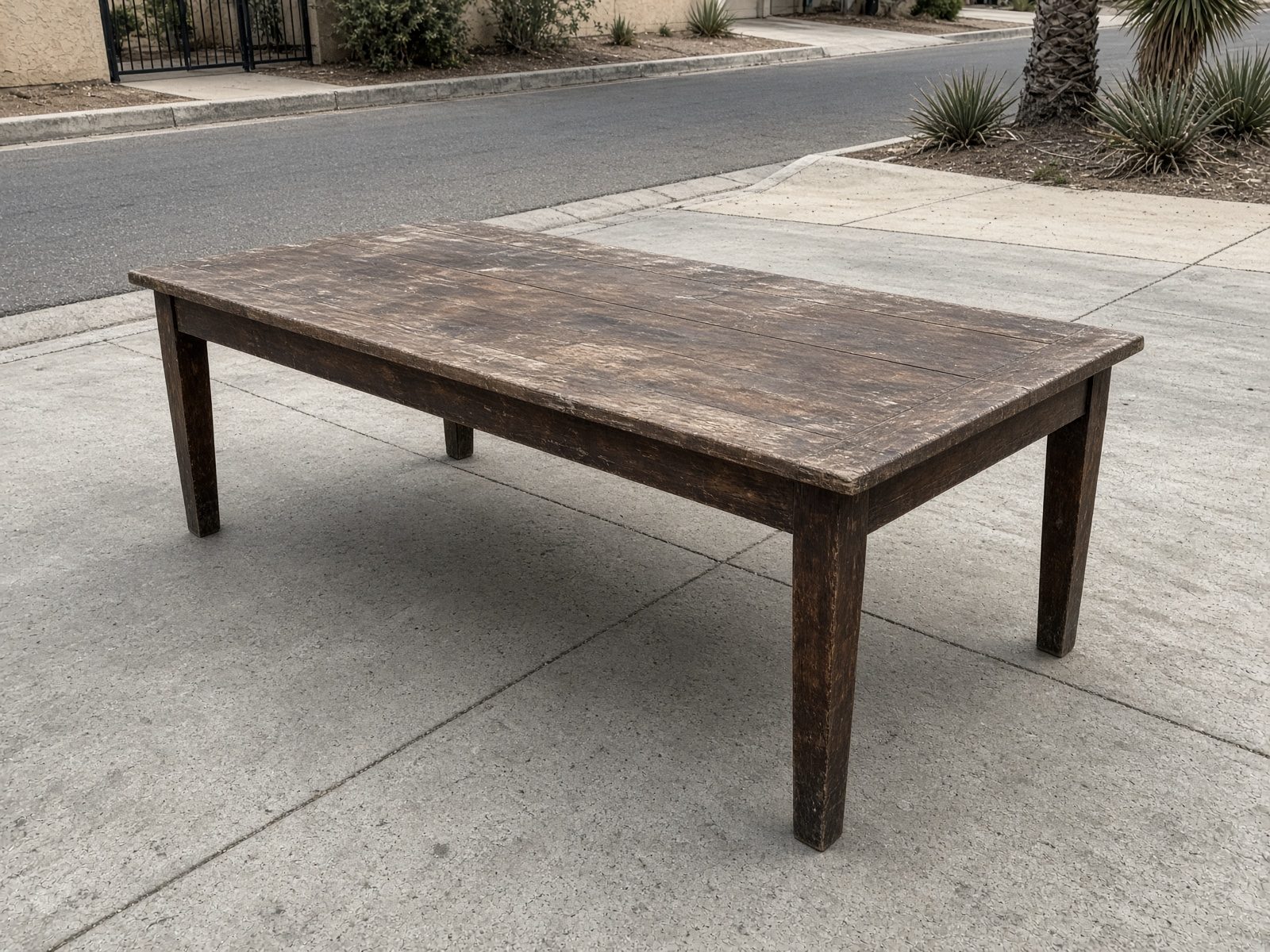 Dining table staged for San Diego furniture removal