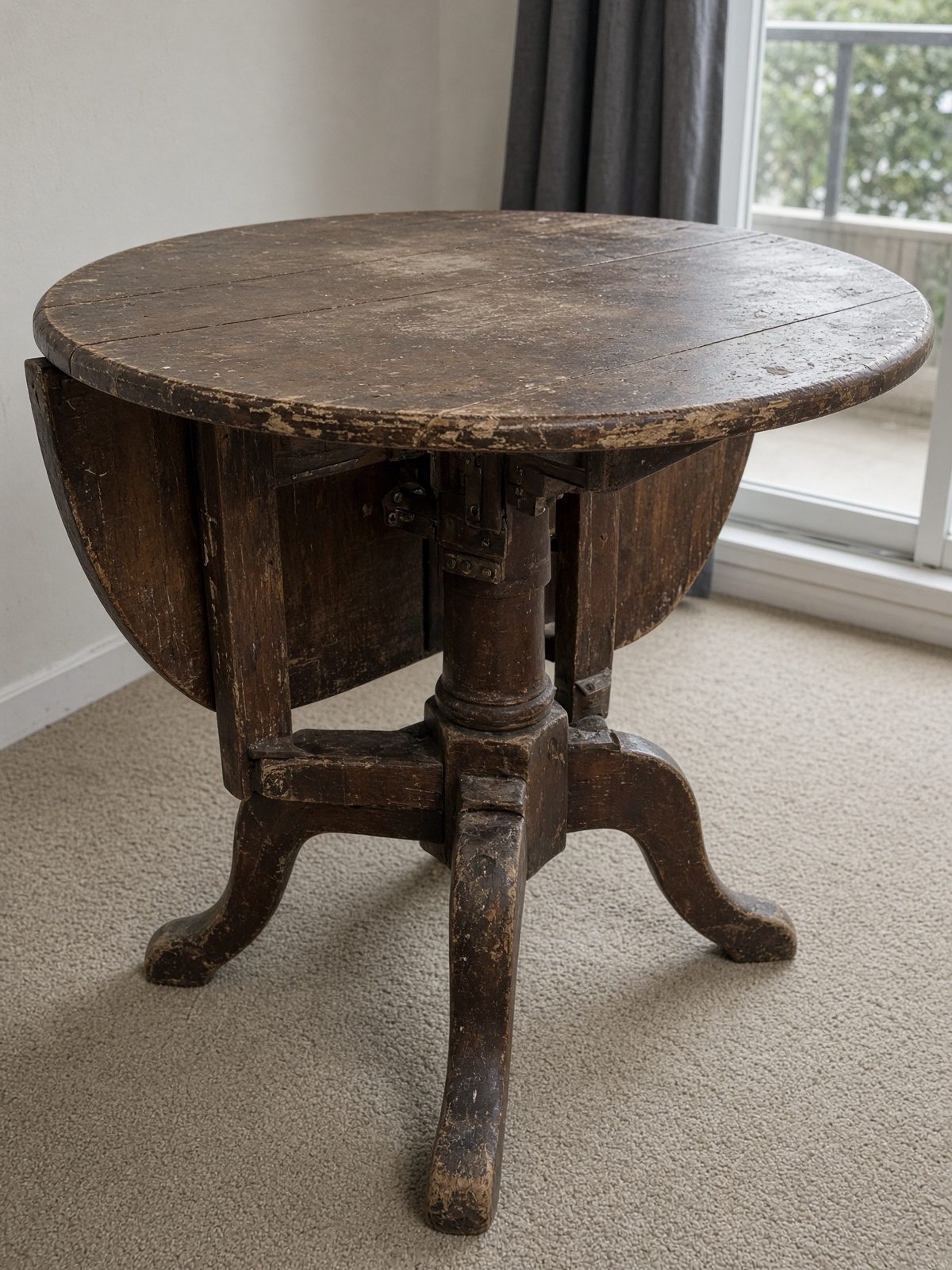 Drop-leaf table ready for haul-away in San Diego